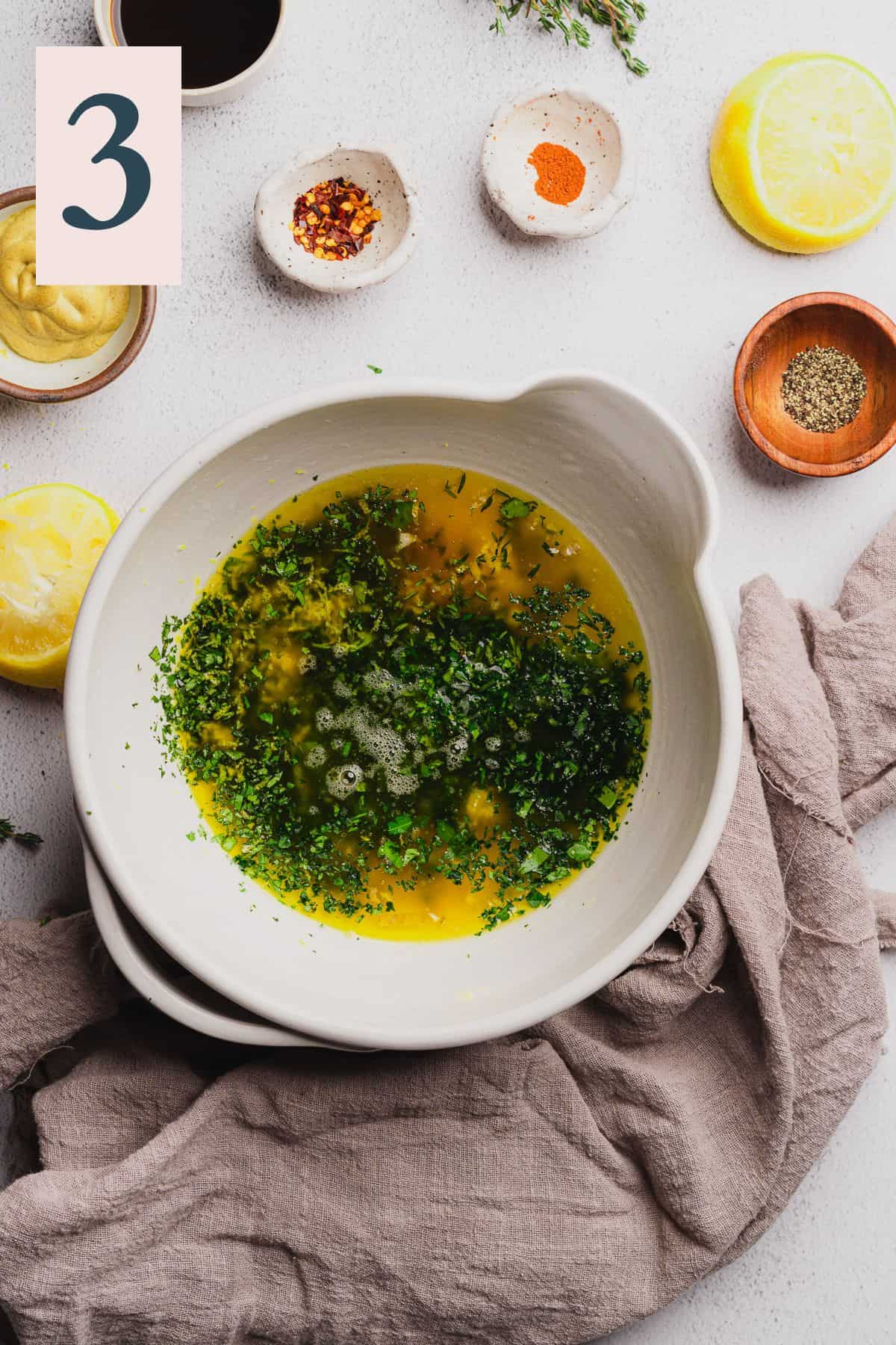 melted butter with chopped herbs, salt, pepper, lemon juice and zest in a mixing bowl.