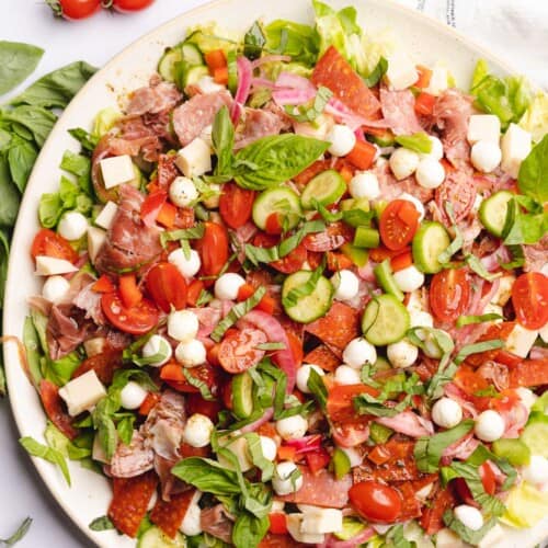gorgeous keto antipasto salad with butter lettuce, lots of vegetables, italian meats and cheeses