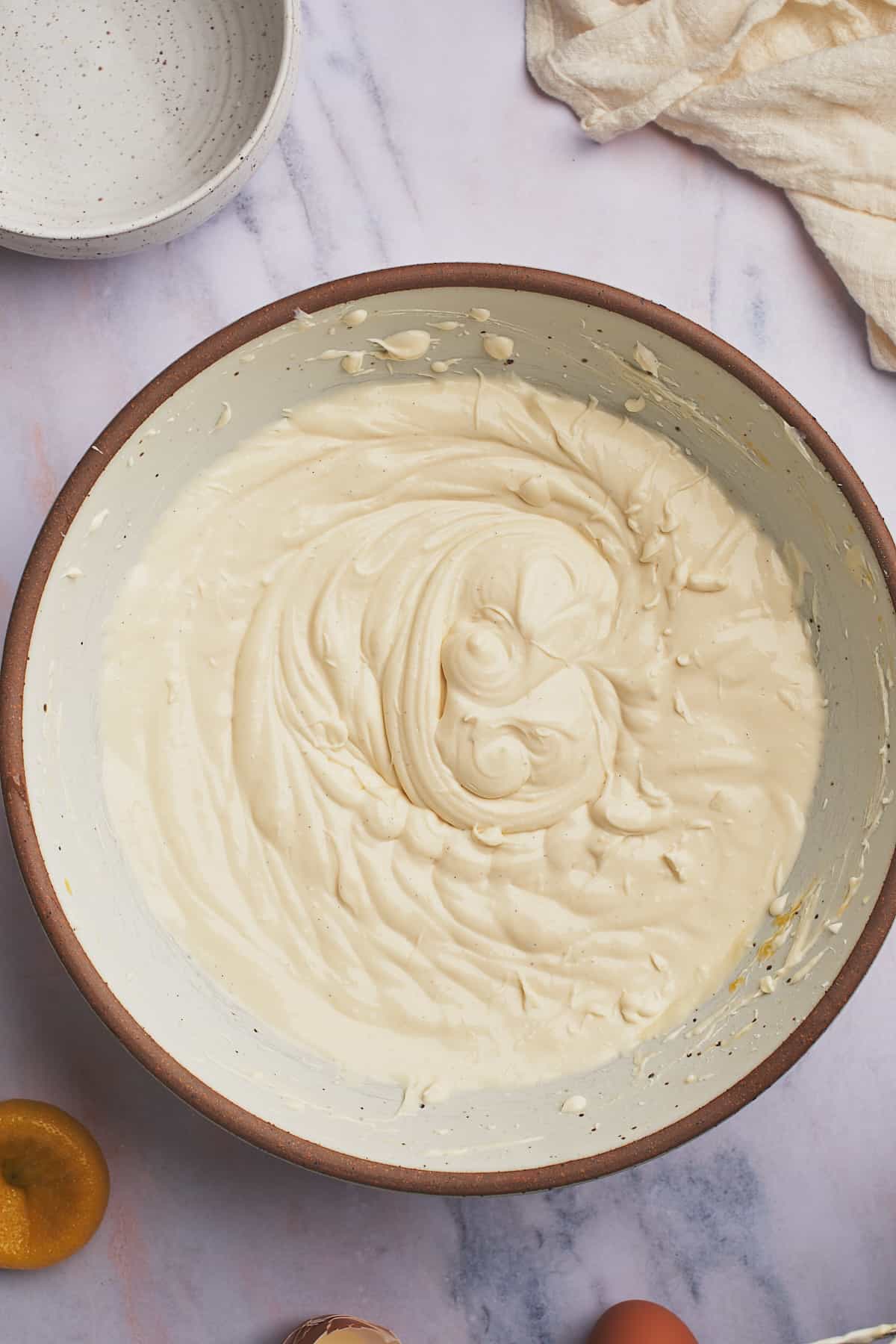 completely mixed cheesecake batter in a large mixing bowl. 