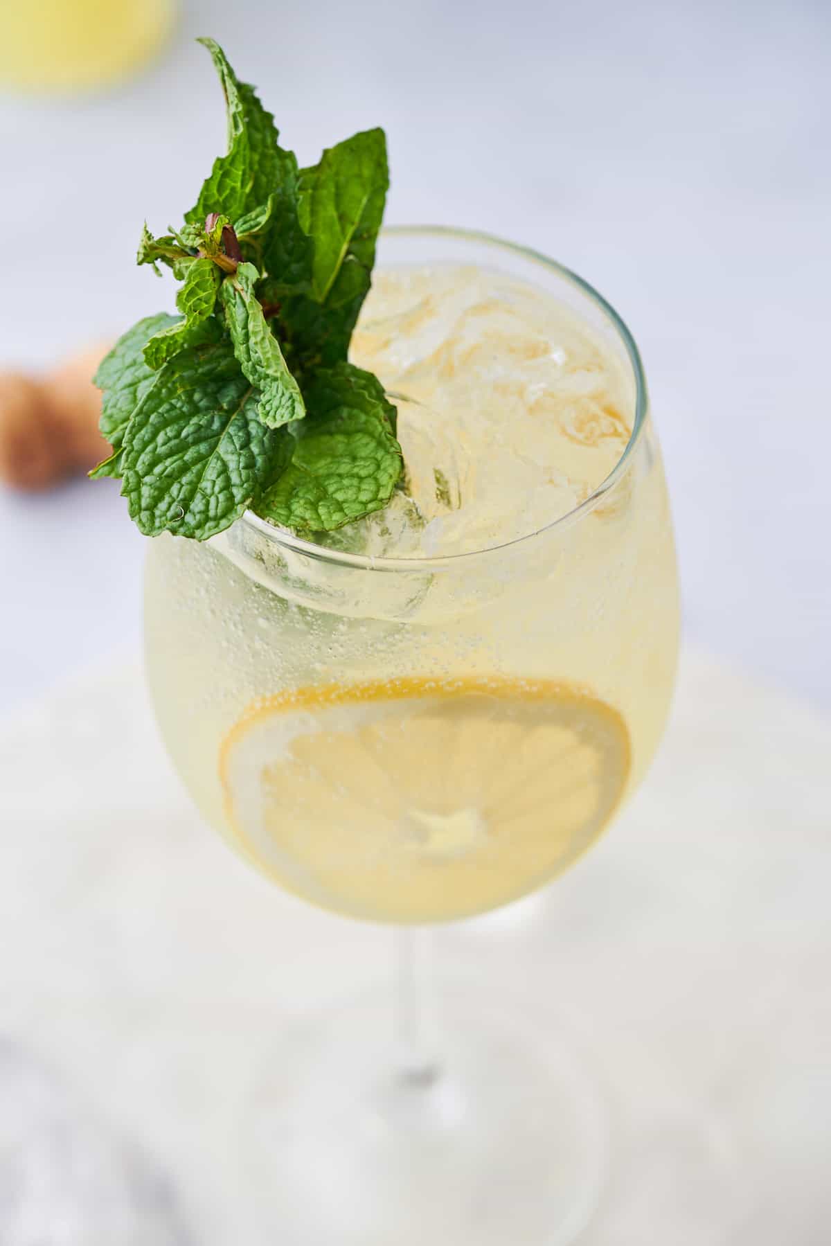 Garnished spritz with fresh mint, ready to drink.