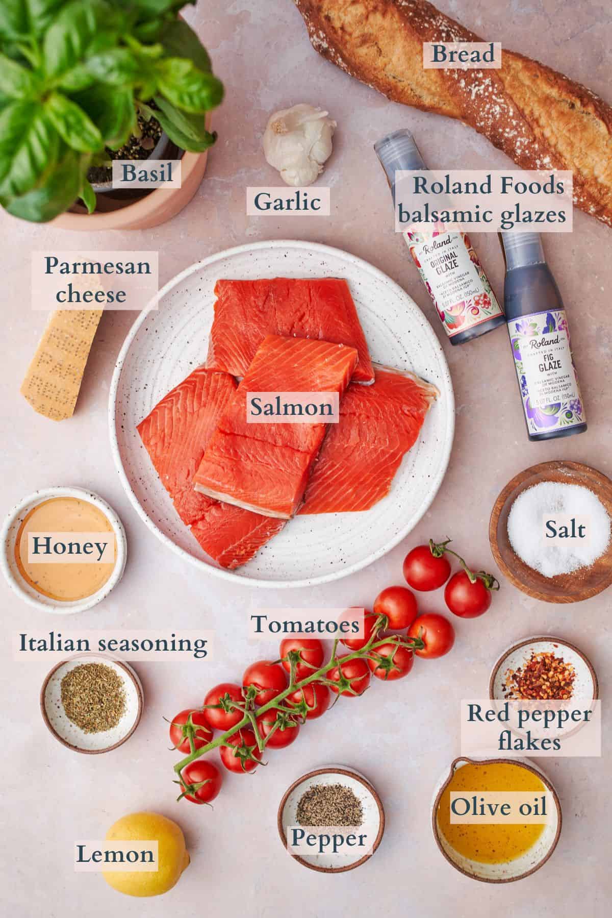 salmon bruschetta ingredients with text overlaying to denote the different ingredients. 