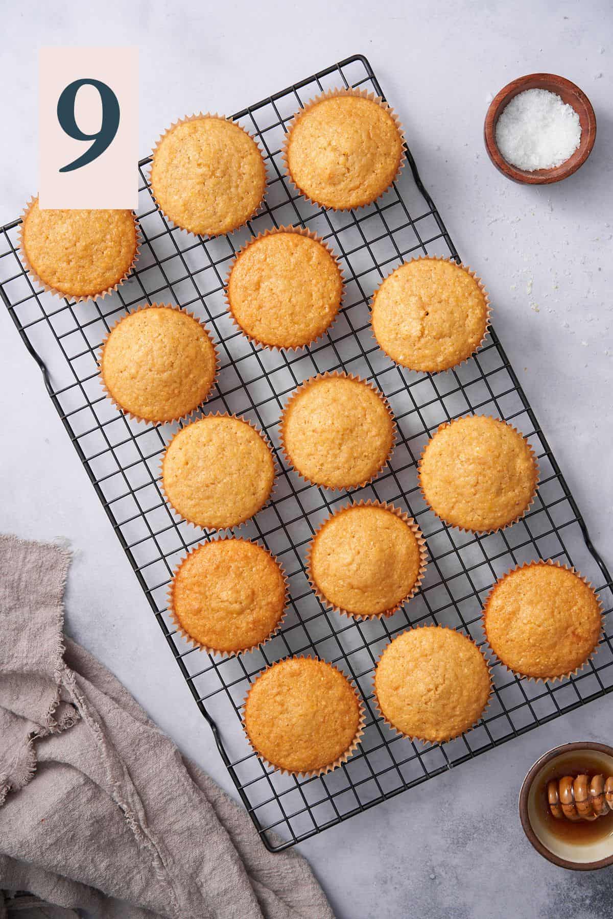 cornbread muffins cooling on a wire rack.