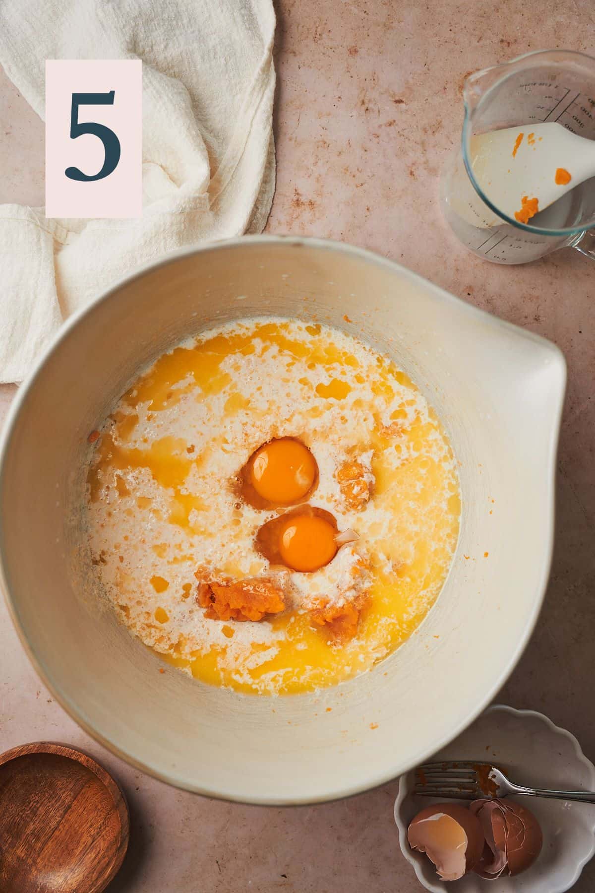 mashed sweet potatoes, eggs, milk, and butter in a large bowl. 